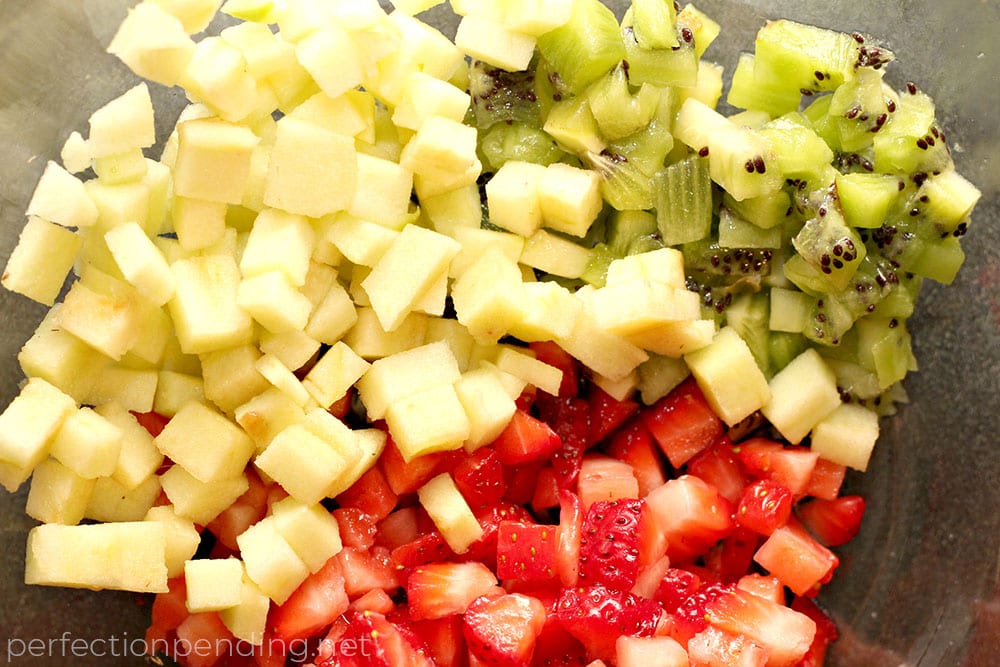 This apple berry summer salsa is the PERFECT treat for the end of summer. It's sweet, refreshing, and soooo delicious! If you're looking for an easy fruit salsa recipe - you'll want to try this. It's a healthy fruit salsa everyone will love. Perfect for last minute barbecues, summer parties, playdates, and even birthdays.