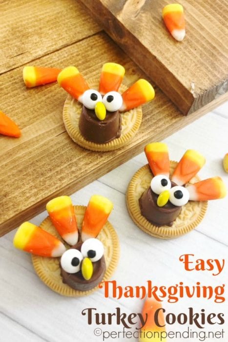 These easy oreo thanksgiving turkey cookies are the best five minute treat you can put together with your kids. Made with golden oreos, rolls, and candy corns, they make a great cookie recipe for Thanksgiving or fall! Perfect for family gatherings, too. #thanksgiving #turkeycookies #cookierecipe #fallcookies #fall #thanksgiving #turkeytreat