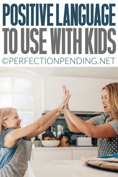 PINTEREST IMAGE OF MOM AND DAUGHTER IN KITCHEN HIGH FIVE